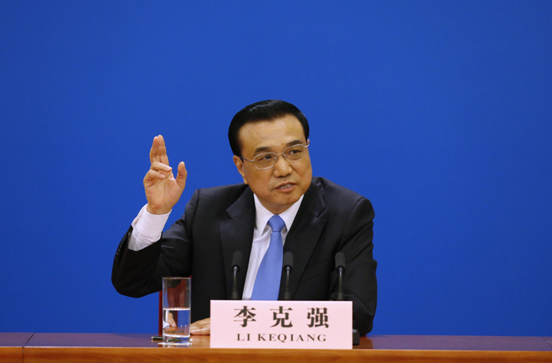 3月15日，國務(wù)院總理李克強在北京人民大會堂與中外記者見面，并回答記者提問。 新華社記者 沈伯韓 攝