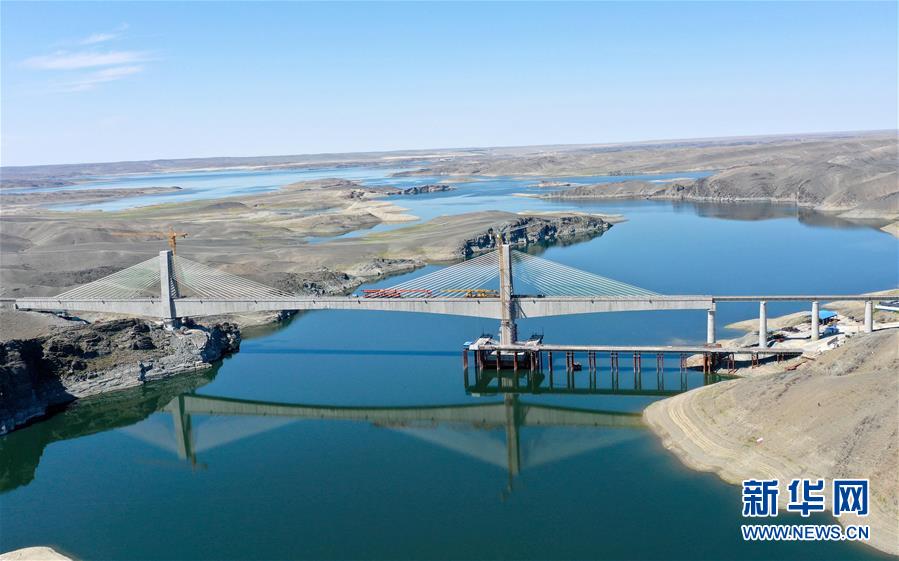 (經(jīng)濟(jì))(1)阿富準(zhǔn)鐵路鋪軌全線(xiàn)貫通 北疆鐵路環(huán)線(xiàn)正式形成