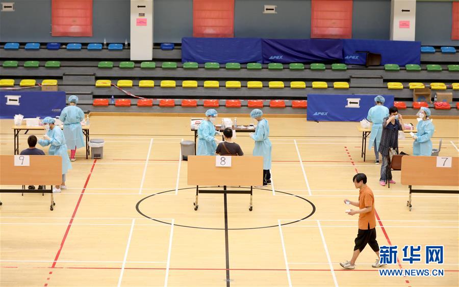 （圖文互動(dòng)）（4）&ldquo;身為醫(yī)護(hù)人員一分子，應(yīng)該出來幫忙&rdquo;&mdash;&mdash;參與新冠病毒社區(qū)檢測的香港醫(yī)護(hù)人員速寫