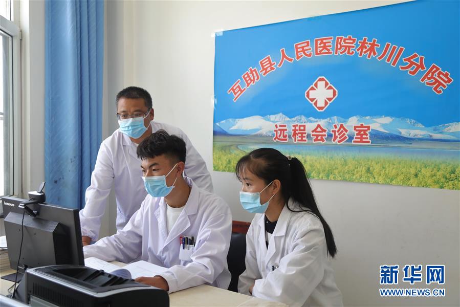 (圖文互動)(2)隔屏看專家 “醫(yī)共體”緩解看病難