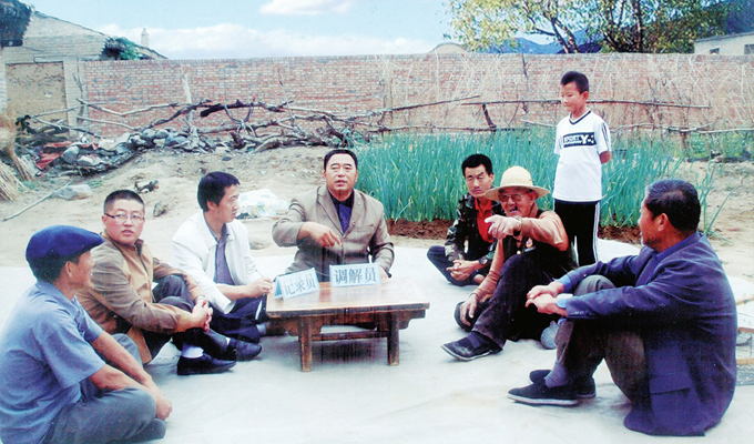 調(diào)解&ldquo;家長(zhǎng)里短，雞毛蒜皮&rdquo;的小事情是李培斌從事的大事業(yè)