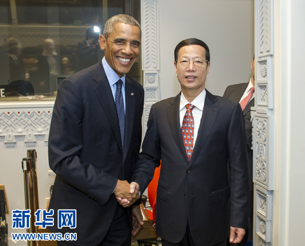 9月23日，國家主席習近平特使、國務院副總理張高麗在紐約會見出席聯(lián)合國氣候峰會的美國總統(tǒng)奧巴馬。 新華社記者王曄攝
