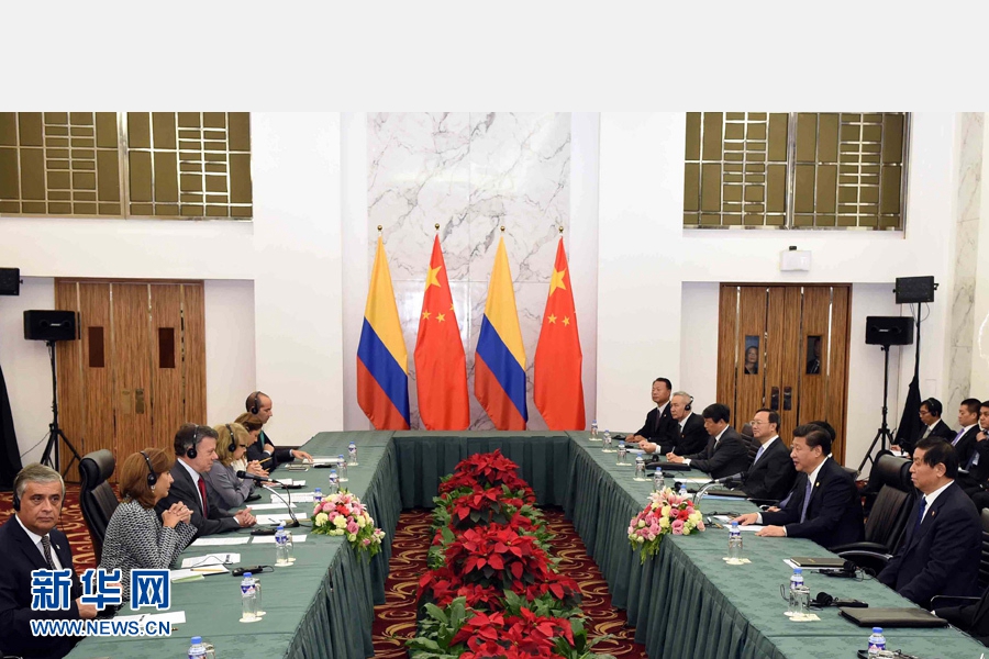 11月18日，國家主席習近平在菲律賓馬尼拉會見哥倫比亞總統(tǒng)桑托斯。 新華社記者 饒愛民 攝