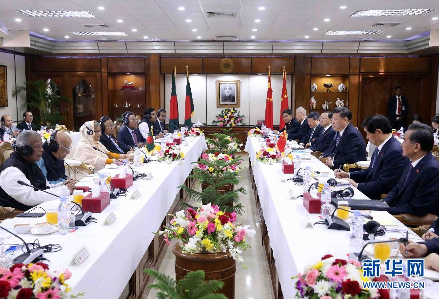 10月14日，國家主席習(xí)近平在達(dá)卡同孟加拉國總理哈西娜舉行會談。 新華社記者劉衛(wèi)兵攝 