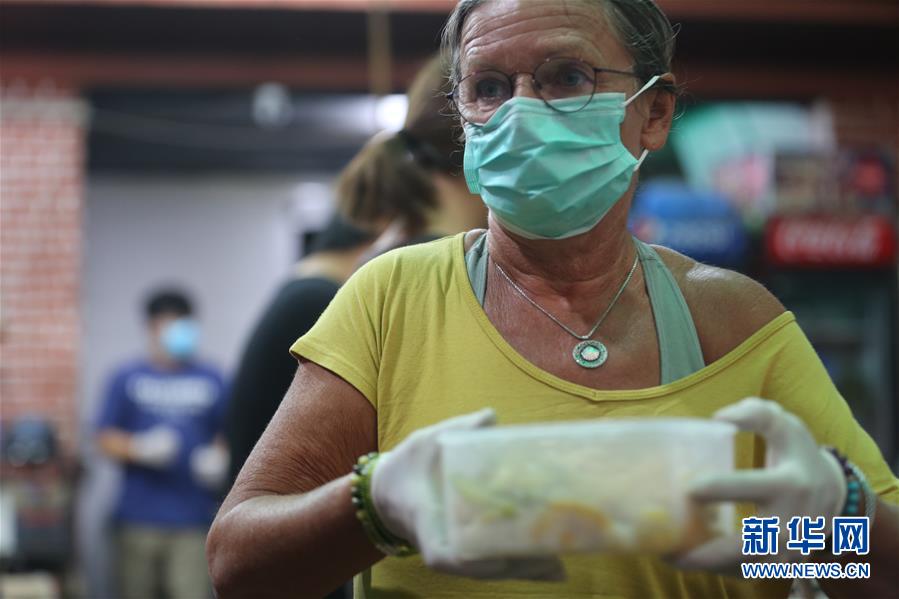 (國(guó)際疫情 ·圖文互動(dòng))(5)通訊:加德滿都中國(guó)人奉獻(xiàn)的“愛(ài)心便當(dāng)”